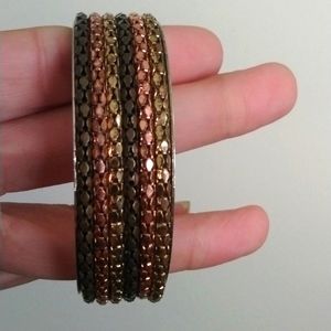 Pretty natural toned metal bangle bracelet